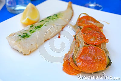 Fisch mit GemÃ¼sebeileage Stock Photo